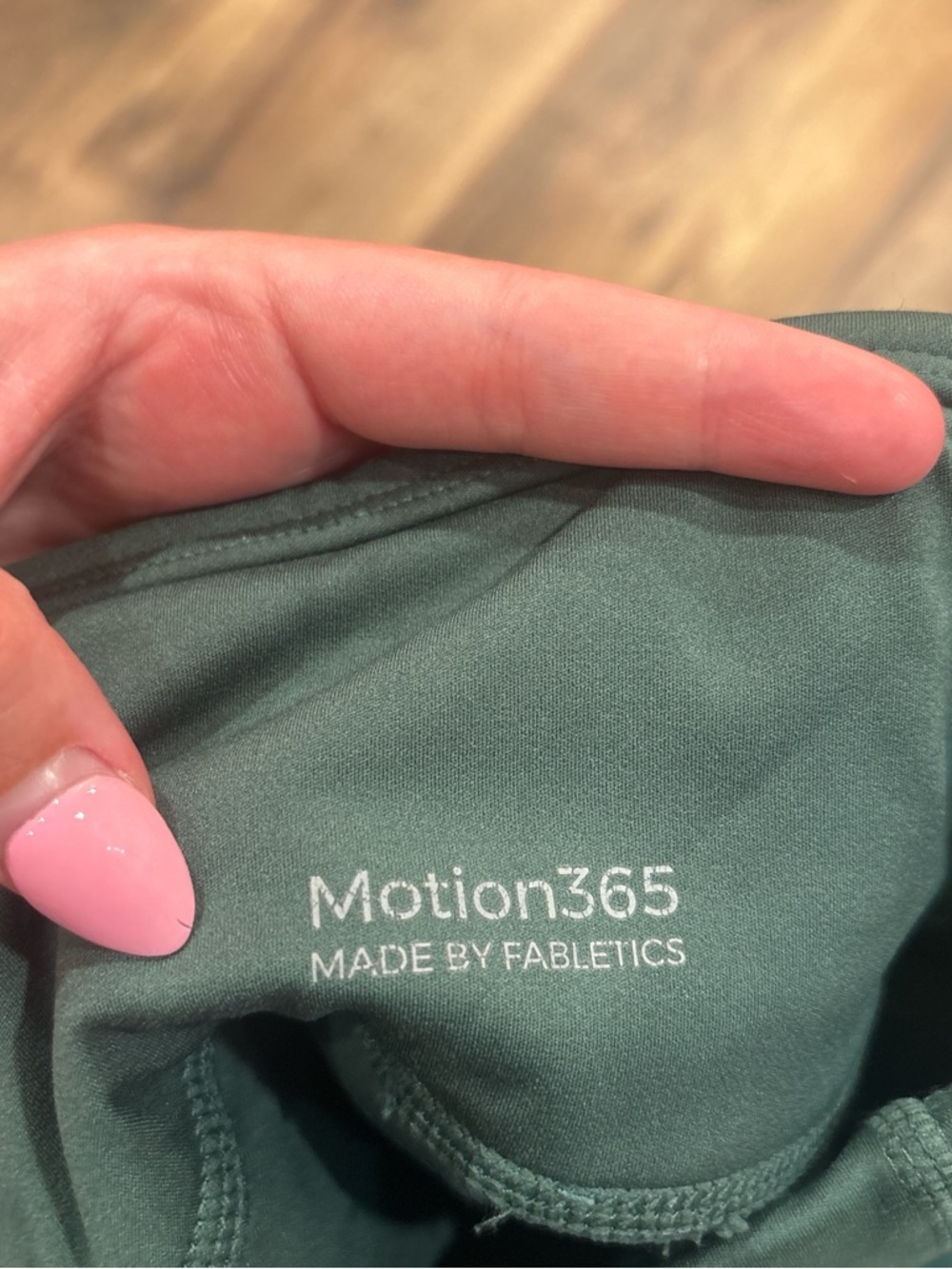 Fabletics Deep Green Performance Leggings with Side Zip Pocket - Picture 5 of 5